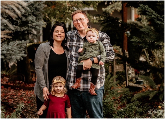 Kevin Waters with his wife and two daughters